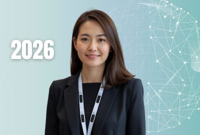 A business woman wearing a custom lanyard for a 2026 event in Canada.