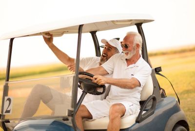 Two Canadian business partners enjoy the start of the promotional golf season after discovering branded golf essentials for their companies.