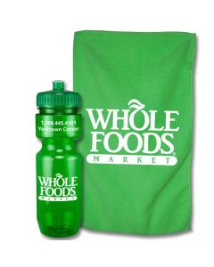 A translucent green 22oz bike bottle with a white logo beside a green towel with a white logo 