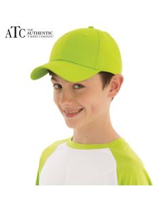 A child wearing a lime green and white baseball t-shirt, white pants and a lime green twill youth cap