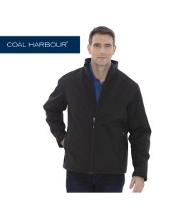 A black insulated soft shell jacket with a full zip being worn by a man with short hair and one hand in his pocket