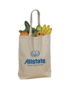 A custom cotton shopper tote filled with fruit and vegetables. The bag is natural coloured with a blue print on the front.