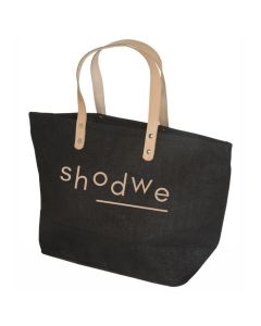 A customized Hamptons tote bag made from jute. The bag is black with brown handles and a brown printed logo.