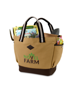 A Heritage Supply garden tote with a green and brown logo. The customized garden tote is light brown with dark trim.