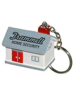 A grey and white coloured house shaped stress reliever on a metal keychain with a metal split ring attached