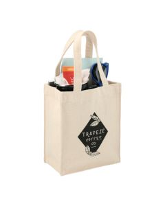 A custom printed mini cotton gift tote filled with swag. The front has a black logo on it.