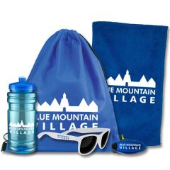 An aqua translucent 20oz water bottle with a white logo with white sunglasses with a blue logo beside it. Behind the bottle there is a blue sports bag with a white logo and a blue rally towel with a white logo