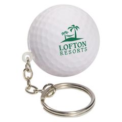 A white golf ball shaped stress reliever with a green logo and a metal keychain and split ring attached