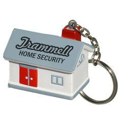 A grey and white coloured house shaped stress reliever on a metal keychain with a metal split ring attached