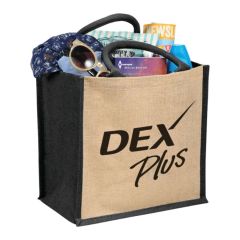 A custom printed medium jute tote with black trim. It is filled with beach essentials and has a black logo on the front.
