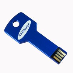 A custom logo USB key shaped drive with a blue body and a silver business brand logo.