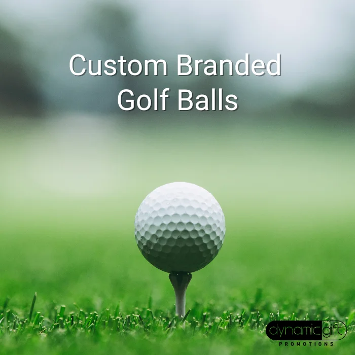 A promotional golf ball sitting on a green in Whistler, Canada.