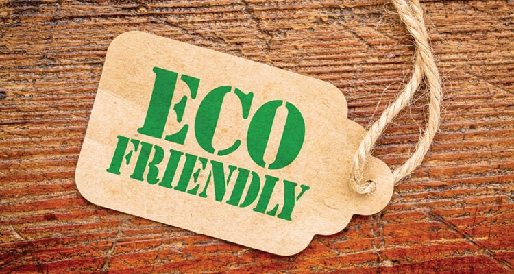Eco friendly tag on a wooden background