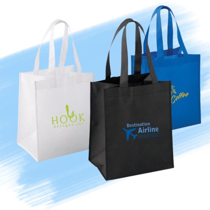 three colours of Mid-Size Non Woven Tote with background pattern