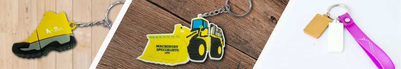 Three images that show plastic keyrings that have been made as custom shapes. The right is a workbook, the middle shows a digger branded with blue text and the right is a silicone loop promoting a new home design.