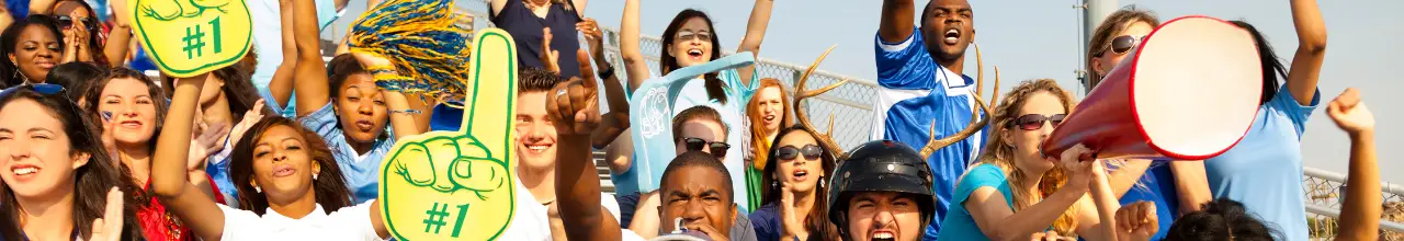 People cheering for their team with megaphones and custom printed foam fingers at an outdoor sports match in Markham.